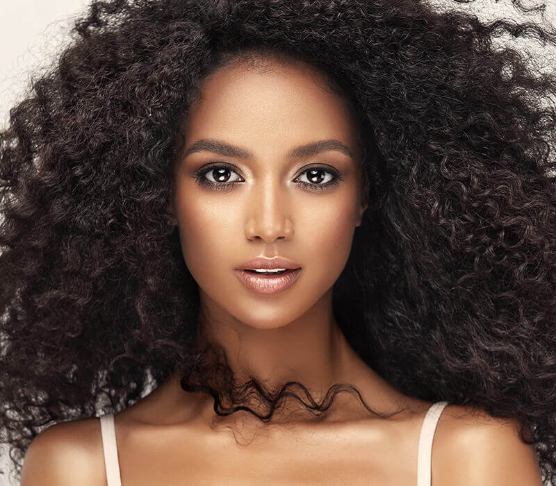 Young woman with curly hair