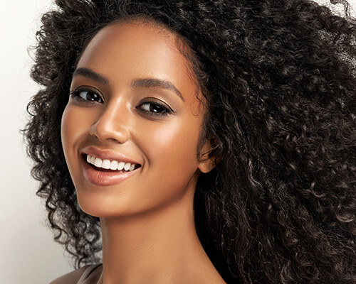 Young woman with curly hair