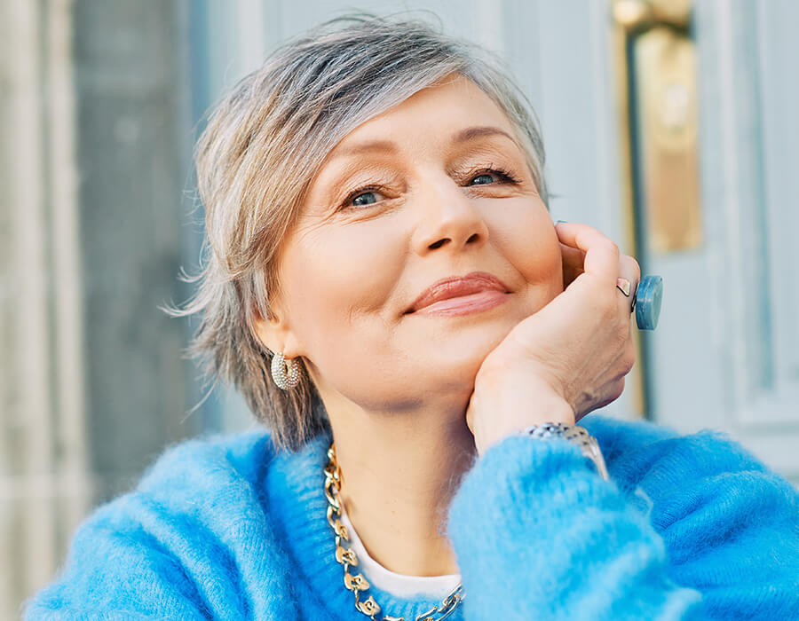 Mature woman in a blue sweater
